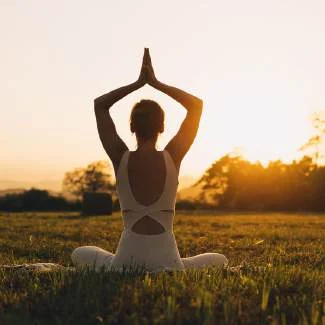 A peaceful outdoor yoga practice at sunrise